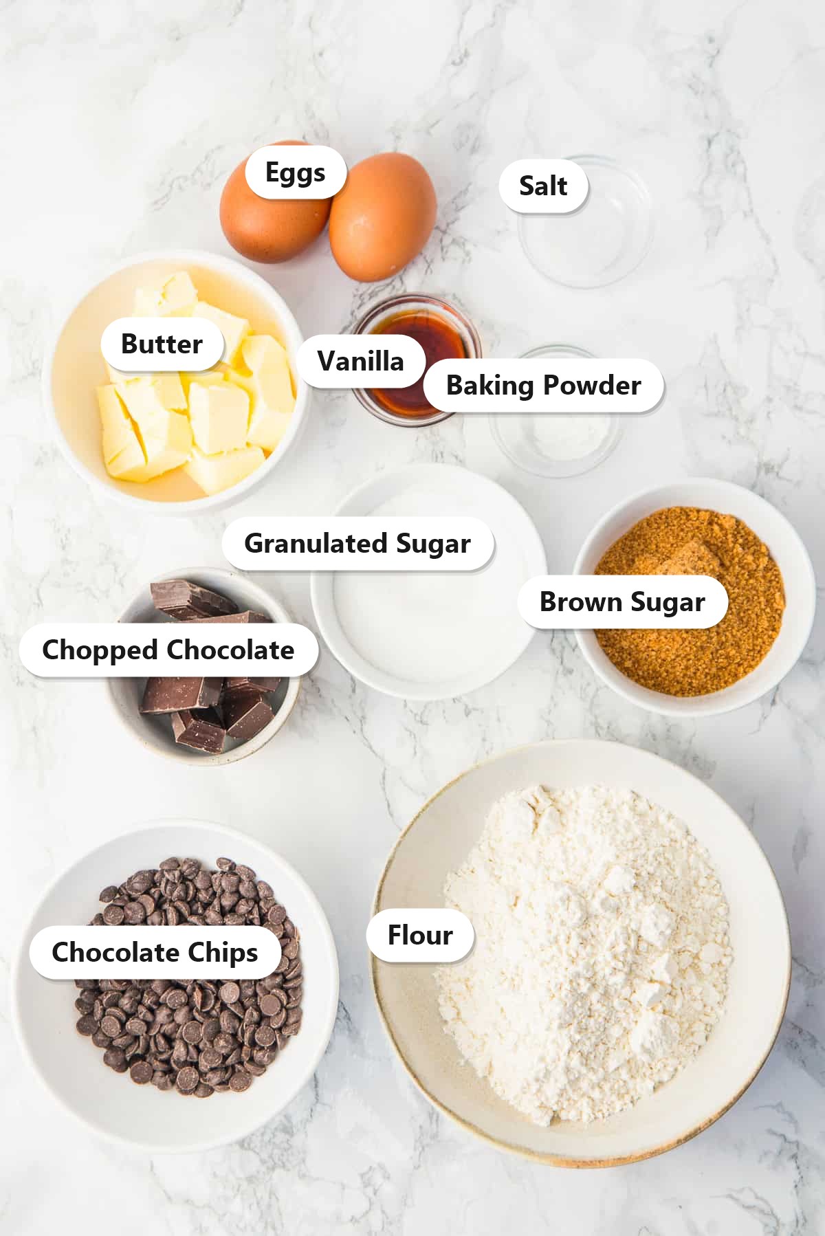 Labeled ingredients for Chocolate Chip Cookie Bars including butter, sugars, flour, and chocolate chips.