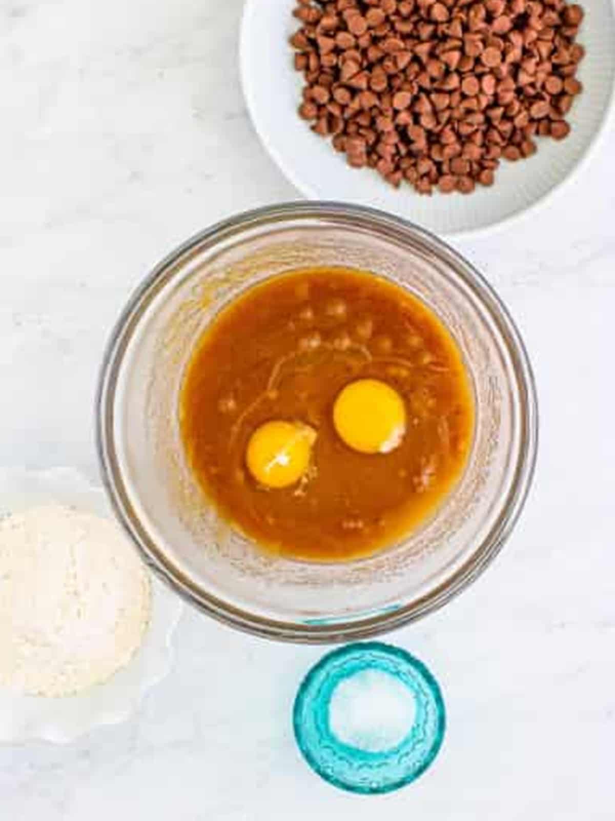 Eggs and vanilla added to the brown sugar and butter mixture.