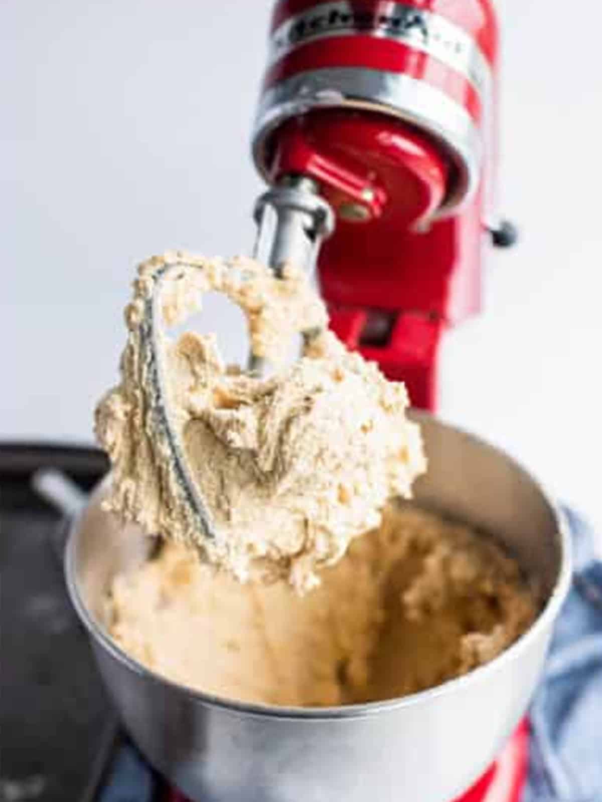 Butter and sugars creamed light and fluffy in a stand mixer for Chocolate Chip Cookie Sandwiches.