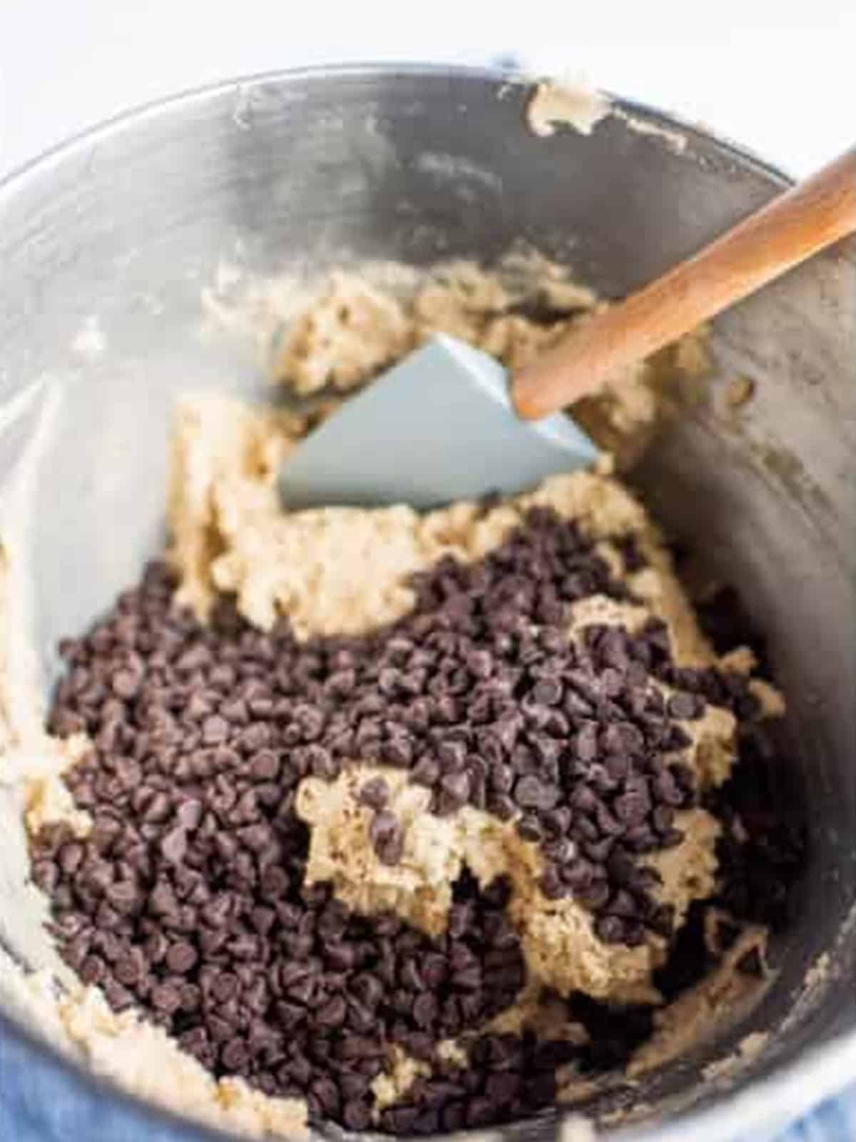 Milk chocolate chips added to cookie dough for Chocolate Chip Cookie Sandwiches.