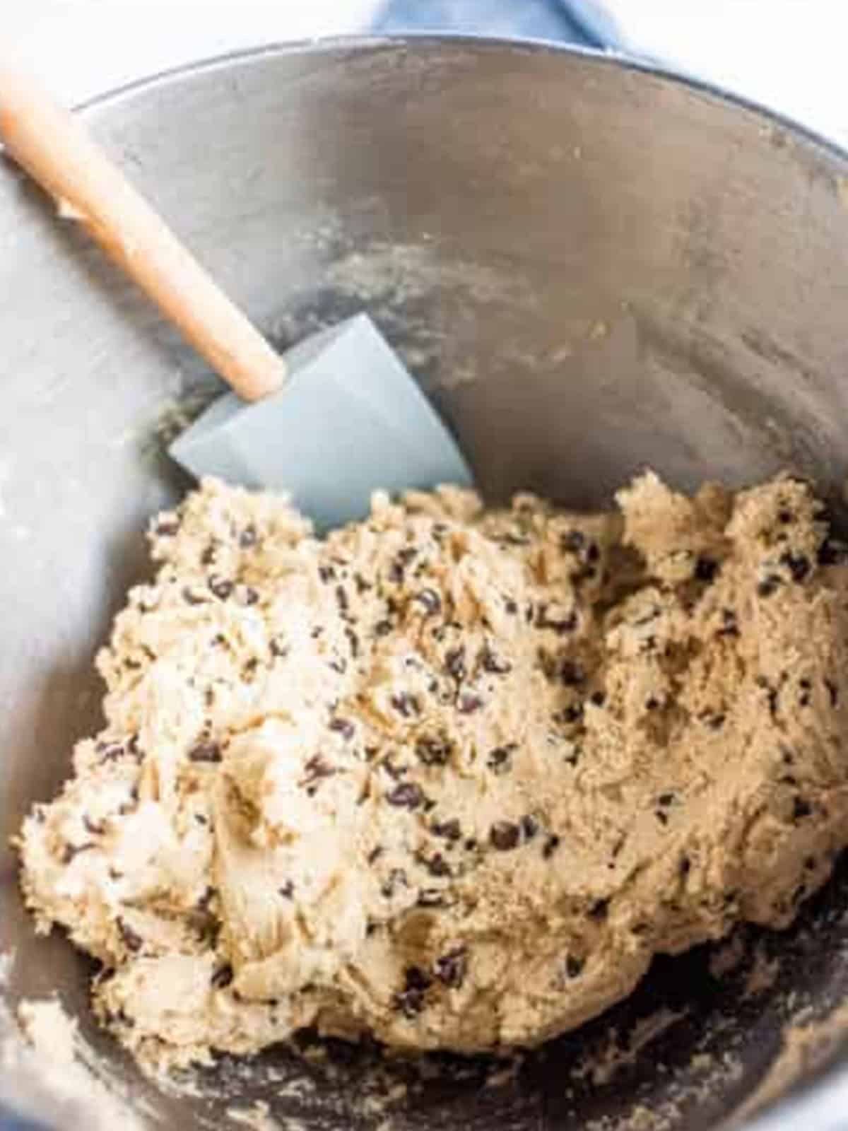 Chocolate chips folded through cookie dough for Chocolate Chip Cookie Sandwiches.