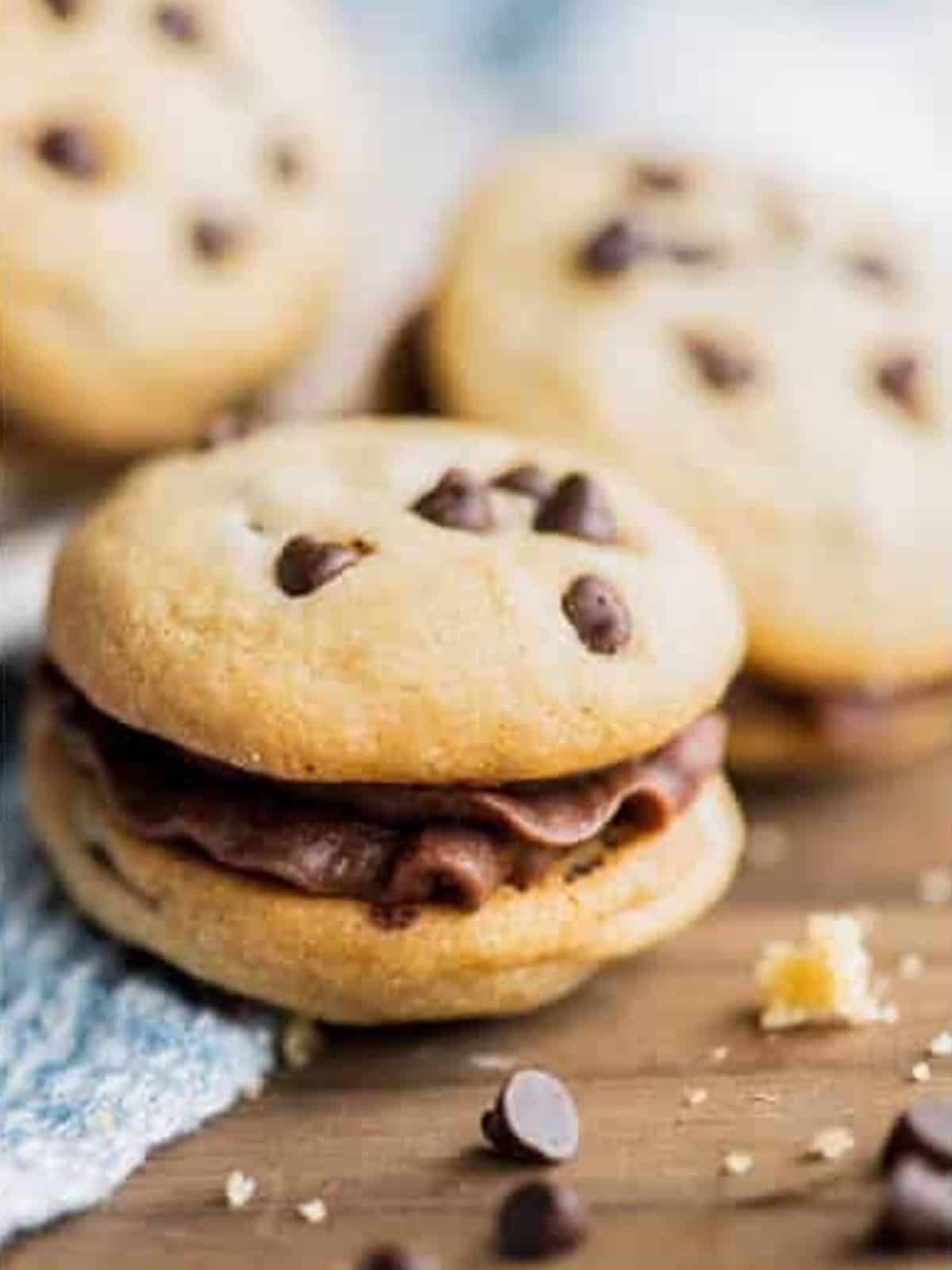 A finished Chocolate Chip Cookie Sandwich stacked with chocolate buttercream filling.