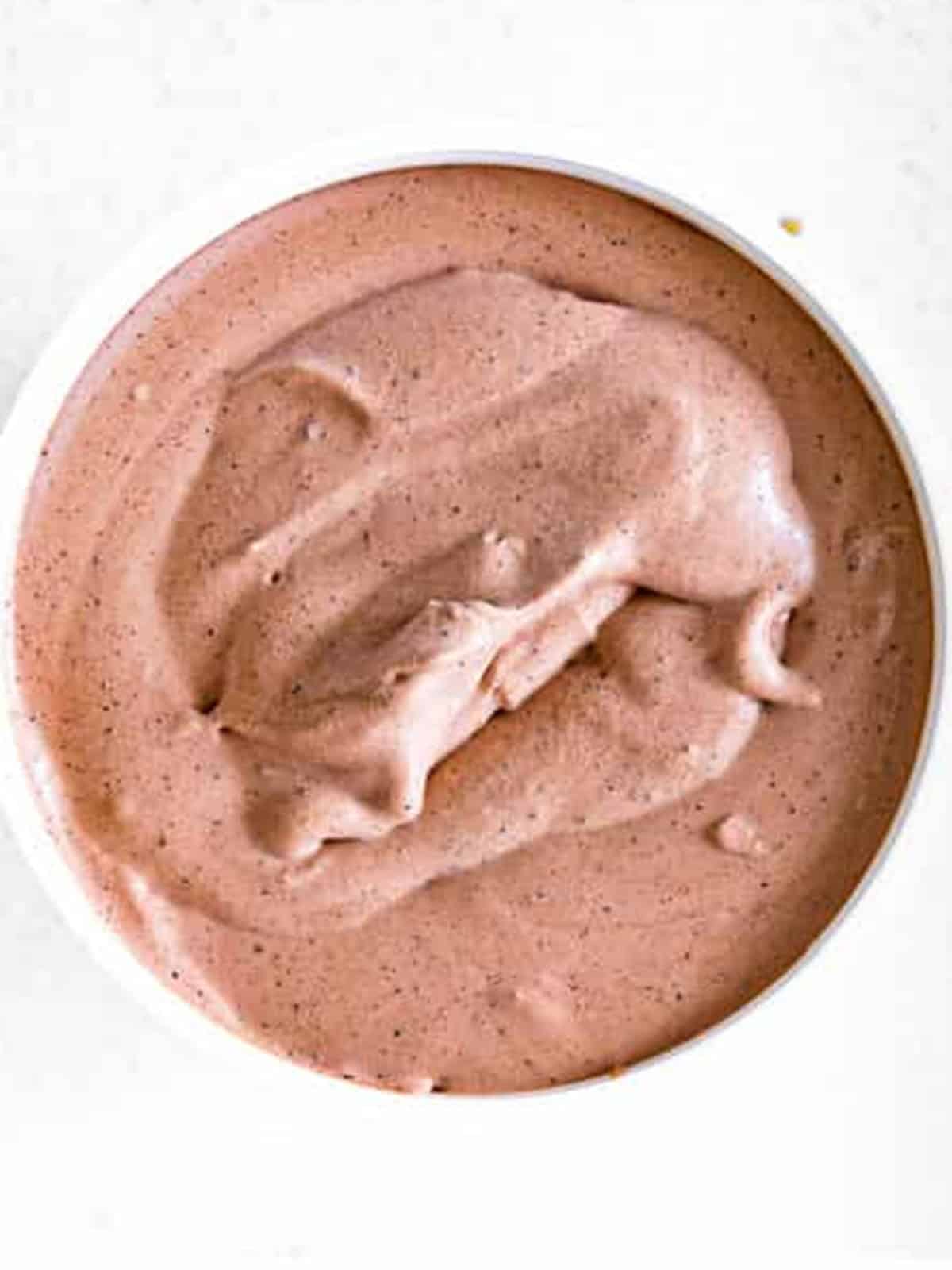 Whipped cream folded into the chocolate base for a light, fluffy no churn ice cream.