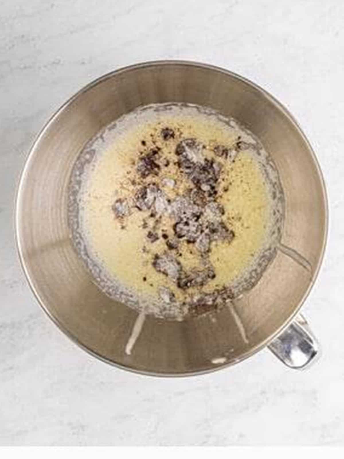 Heavy cream whipped with cocoa and powdered sugar for chocolate mousse.