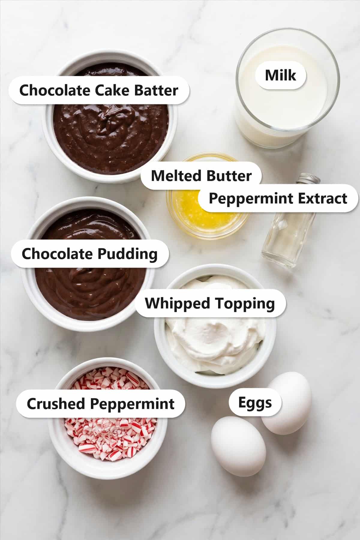Labeled ingredients to make a chocolate peppermint poke cake.