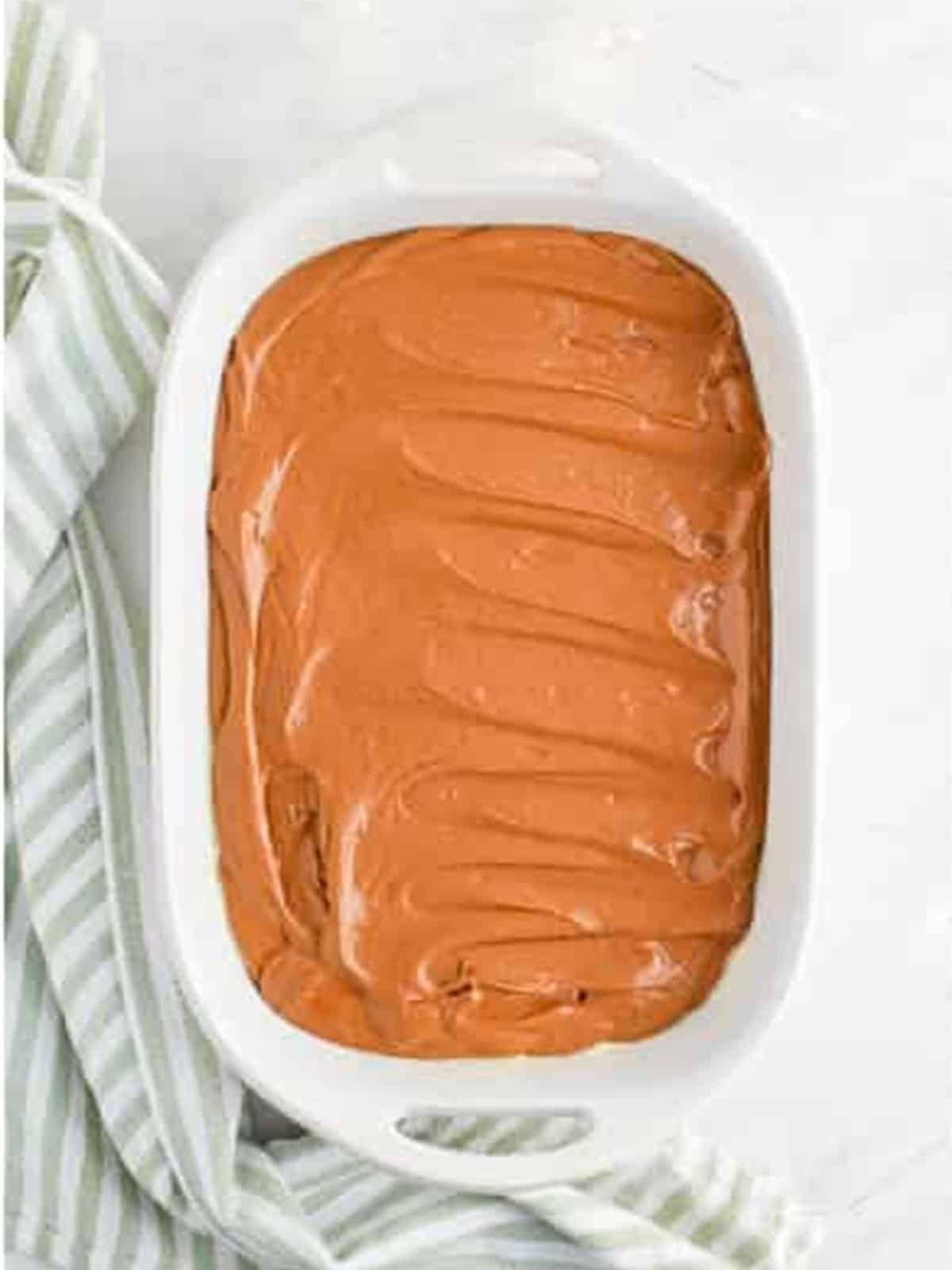 Baked chocolate cake cooling in a baking dish.