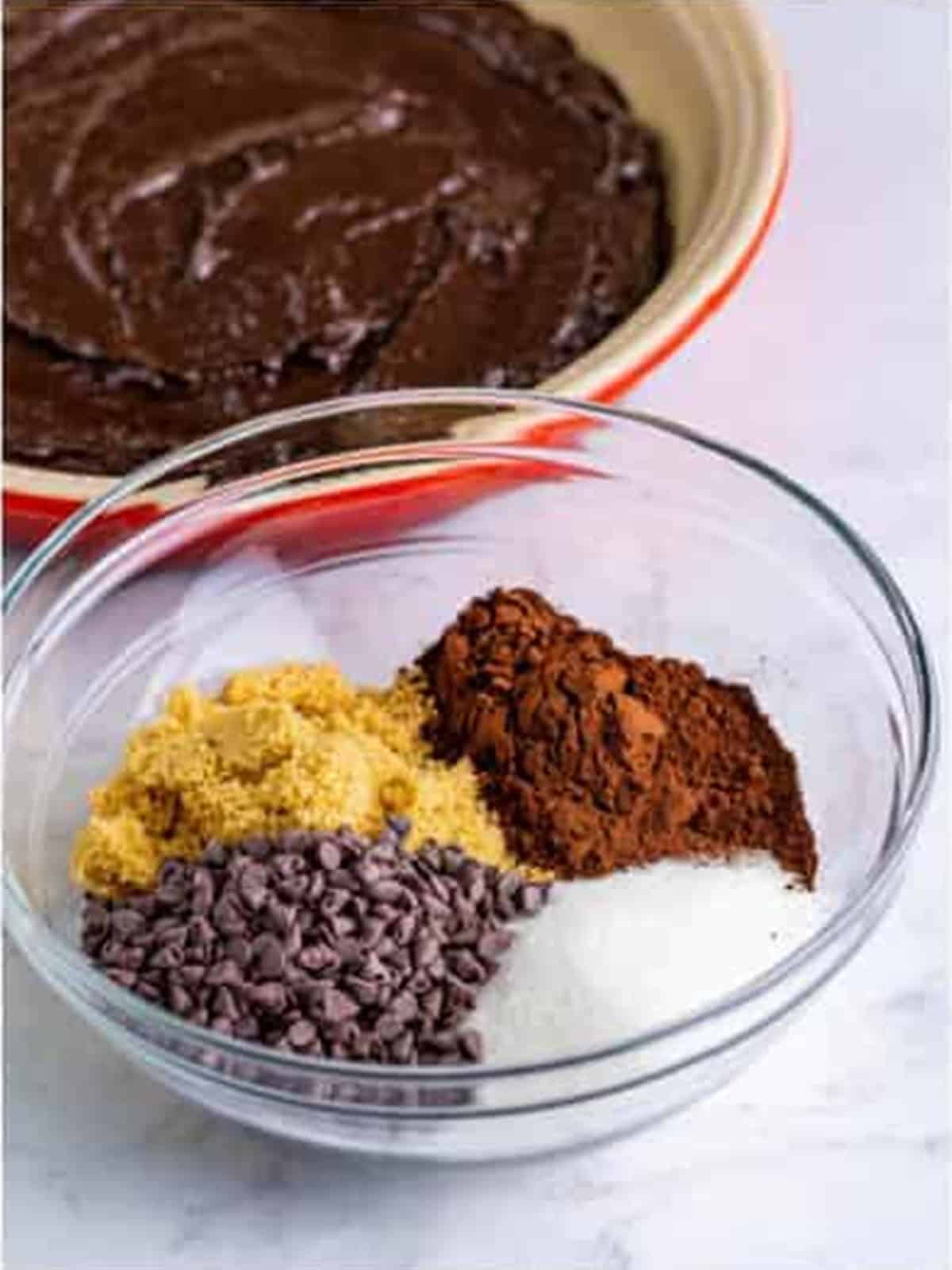 Sugar, brown sugar, cocoa, and chocolate chips for the sauce topping.