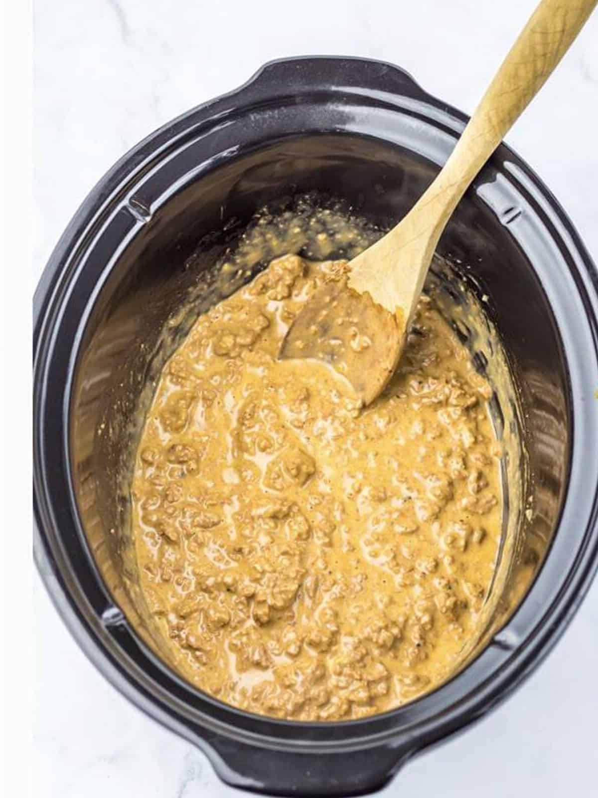 Melted American cheese stirred into the beef to make a creamy chopped cheese filling.