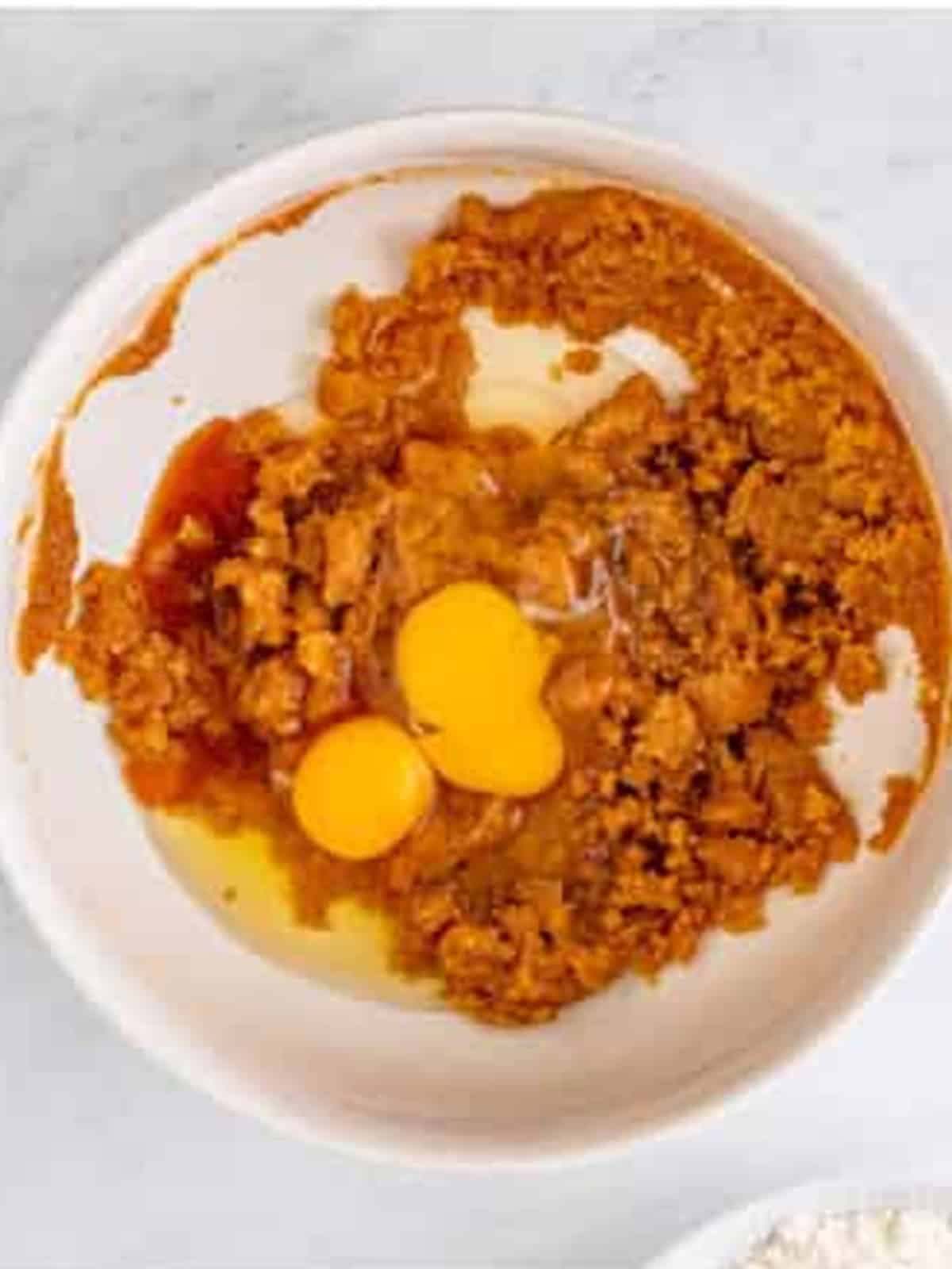 Eggs and vanilla added to the brown sugar and butter mixture.