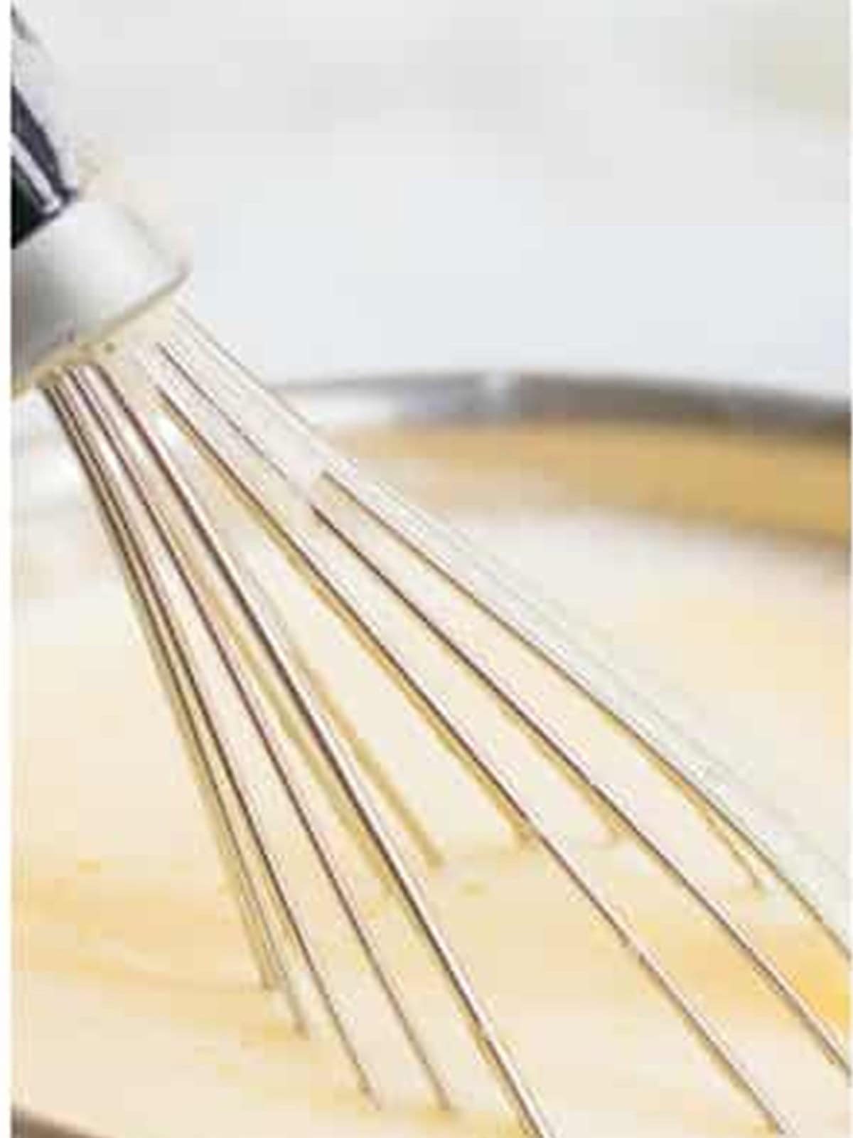 Eggnog custard whisked over medium-low heat until it reaches 165 degrees.