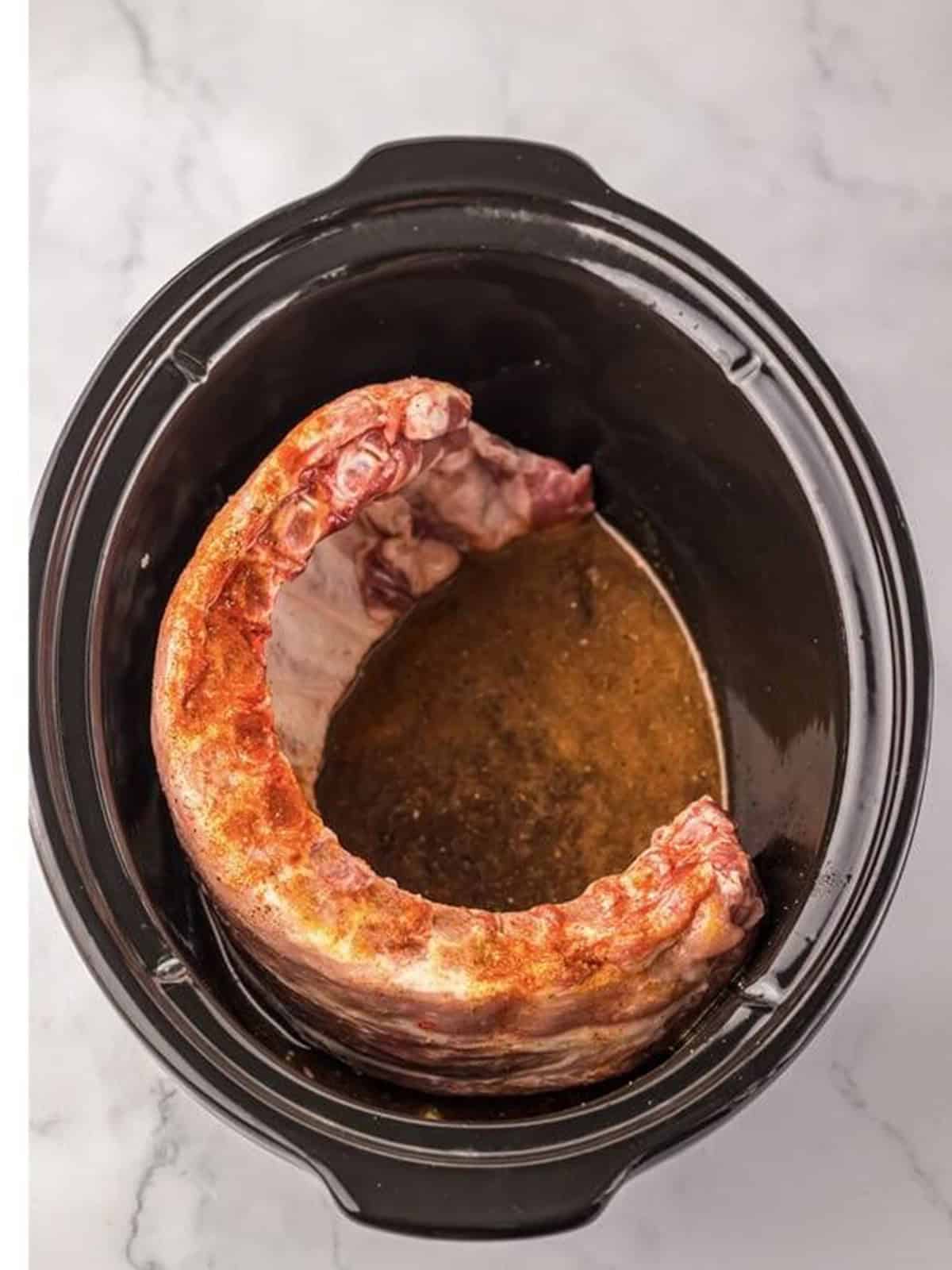 Cherry cola and bbq sauce mixture poured over the ribs.