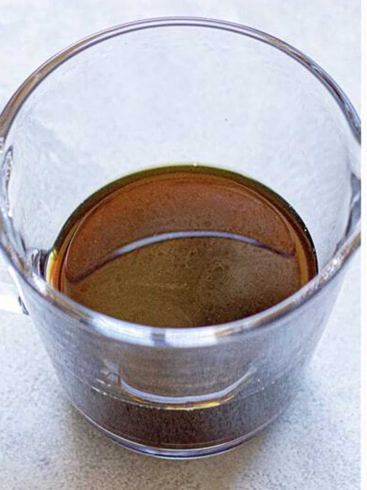 Smooth strained cold brew coffee concentrate in a pitcher.