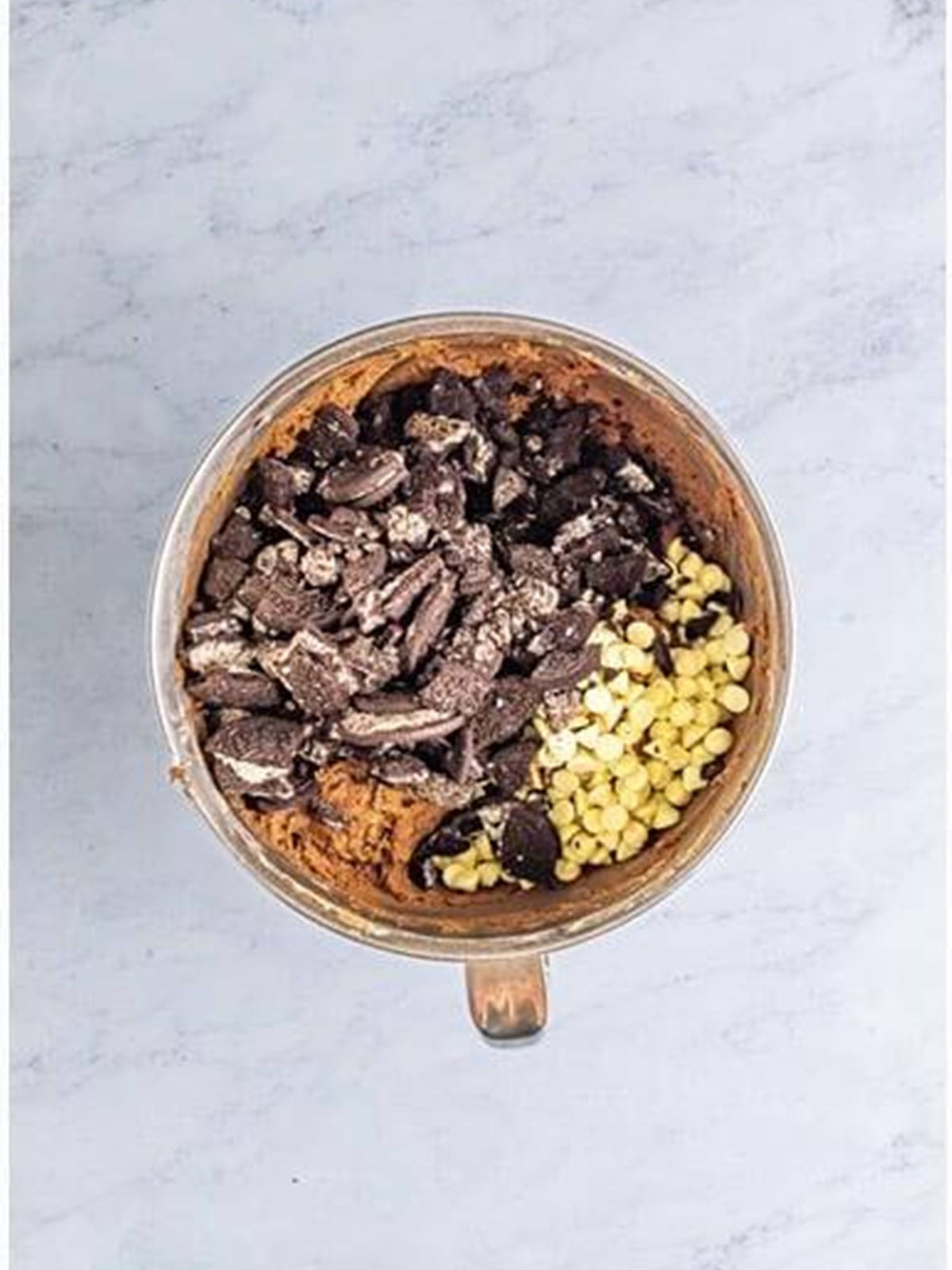 White chocolate chips and crushed Oreos added to the chocolate cookie dough.