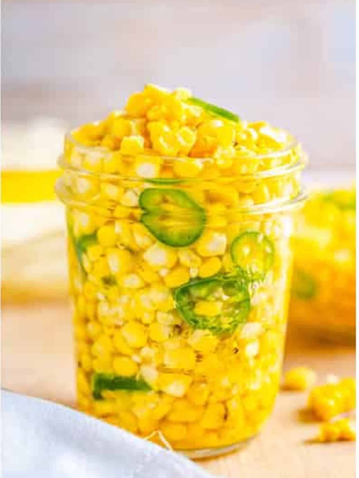 Finished Corn Relish chilled in a mason jar.