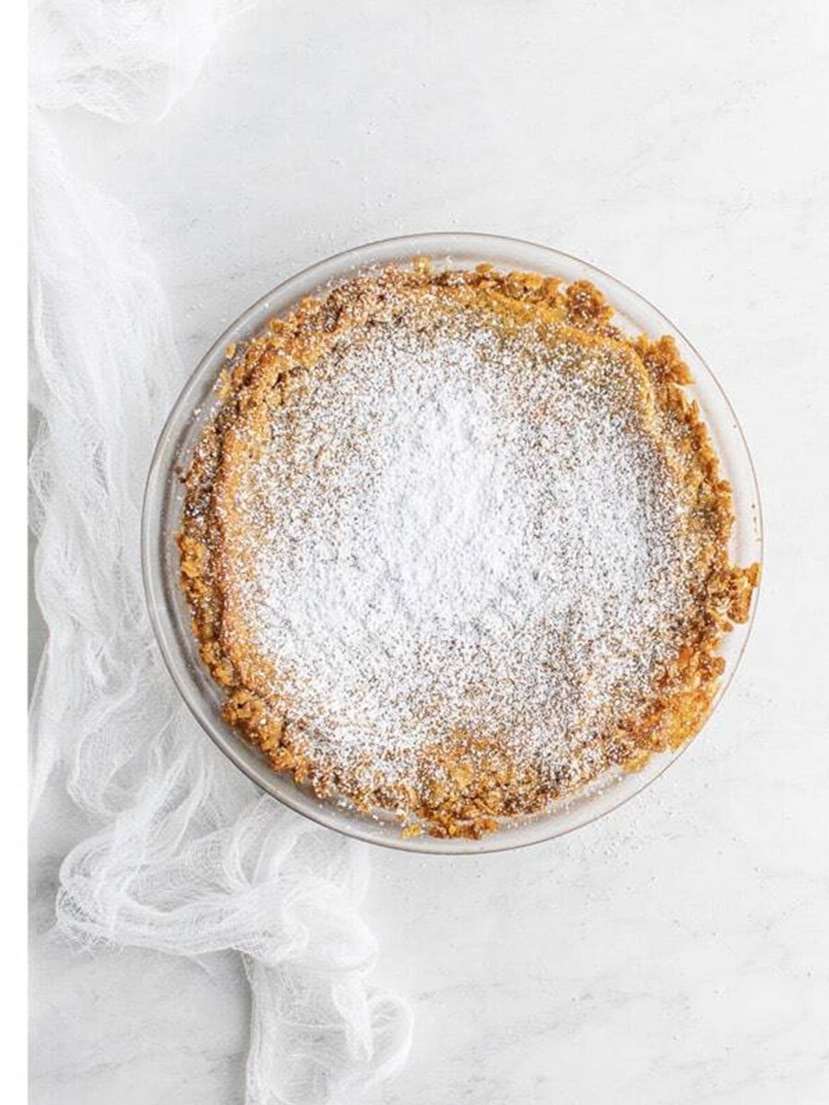 Baked copycat Milk Bar crack pie dusted with powdered sugar.