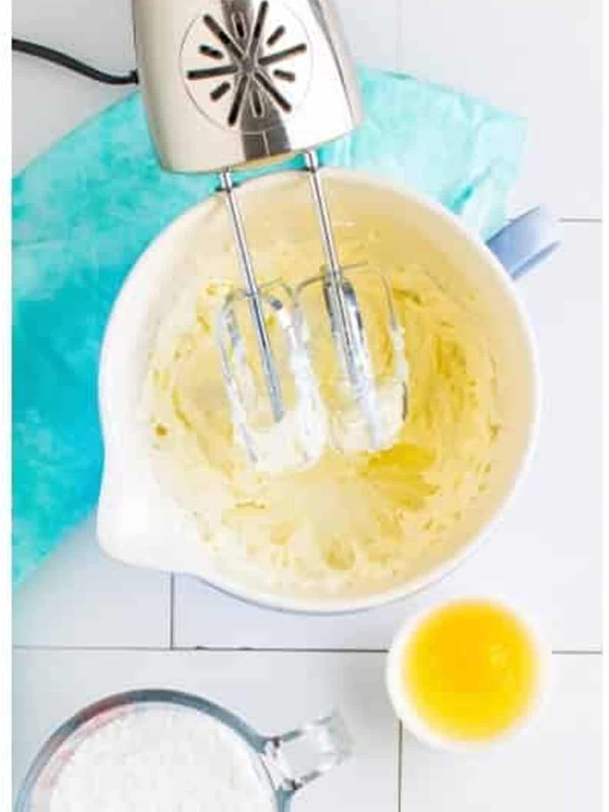 Powdered sugar added to the creamed butter and cream cheese for cream cheese cookies.