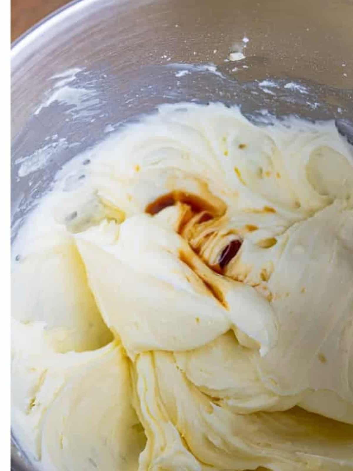 Vanilla added to cream cheese frosting and whipped until light and fluffy.