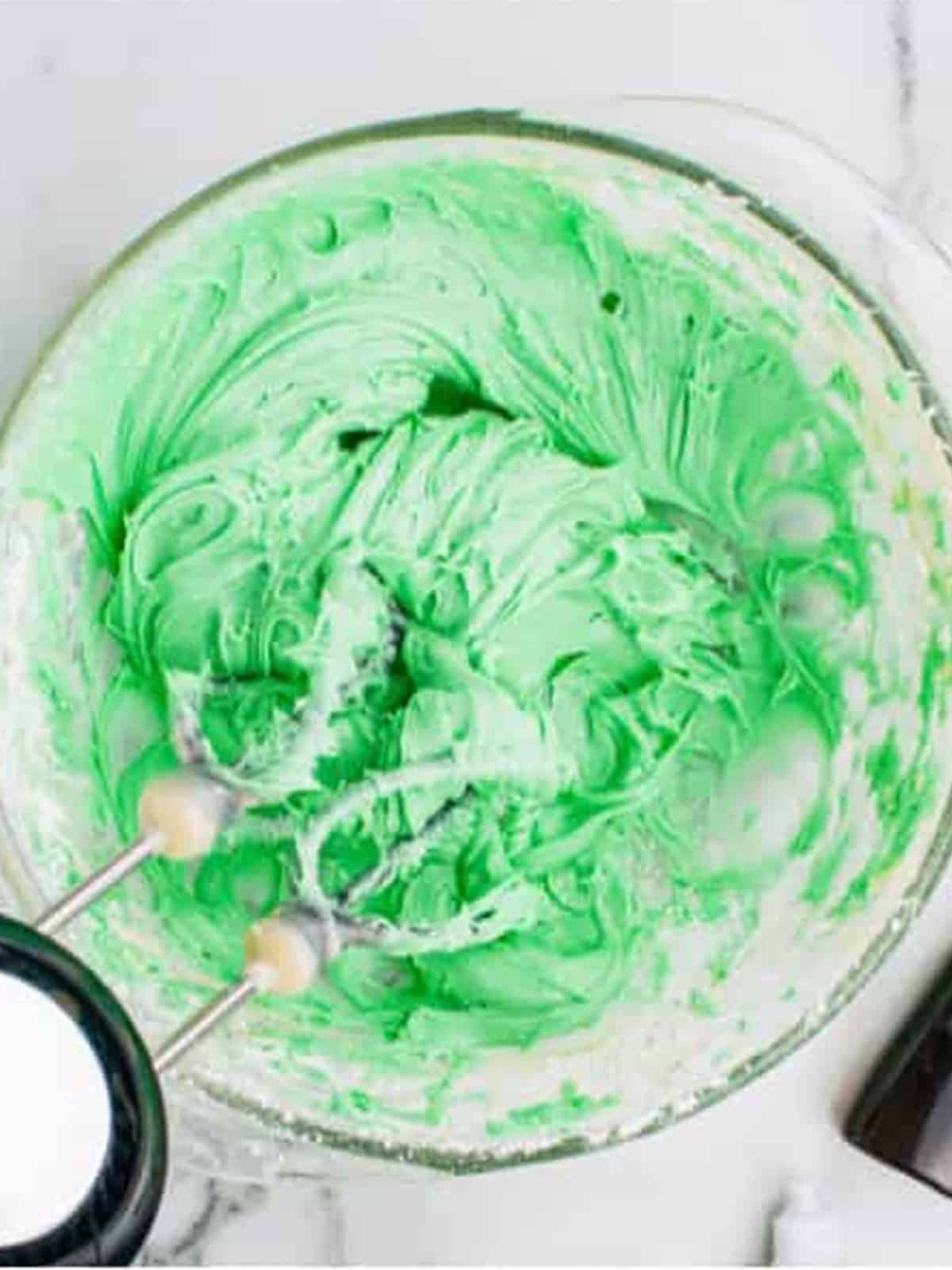 Green food coloring mixed into the cream cheese mint mixture.