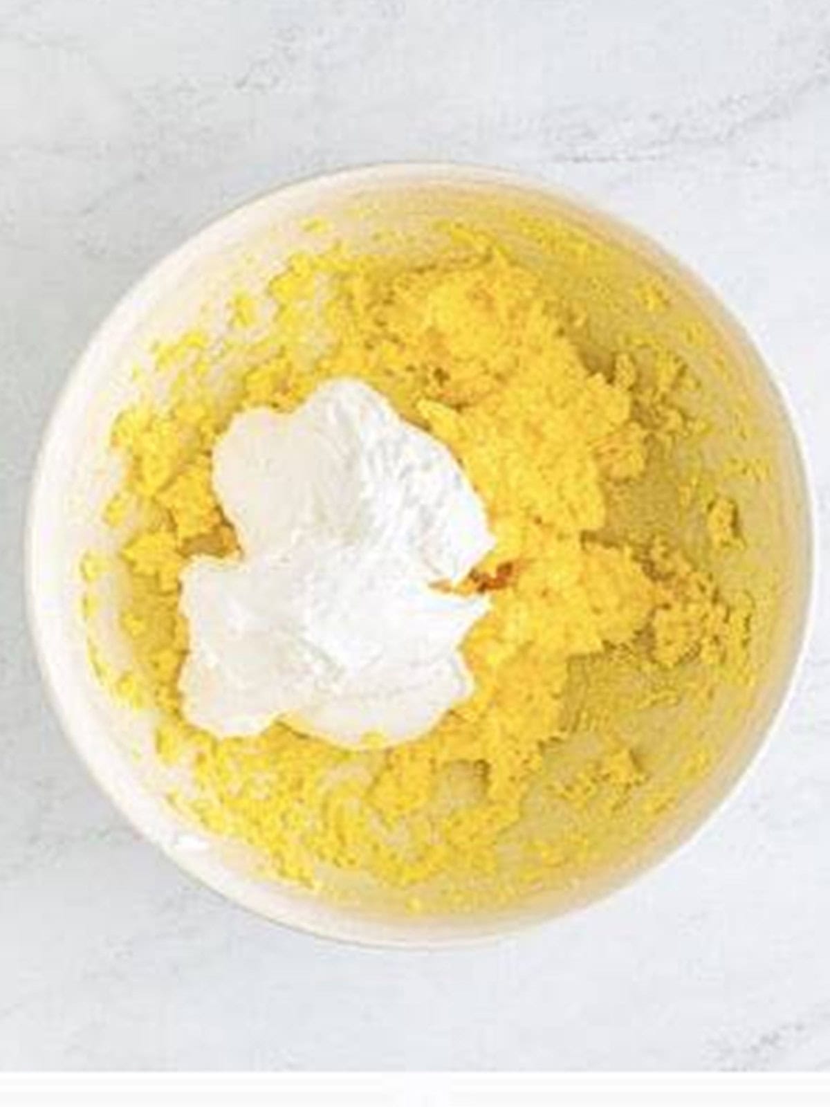 Marshmallow creme added to the cream cheese mixture for pineapple dip.