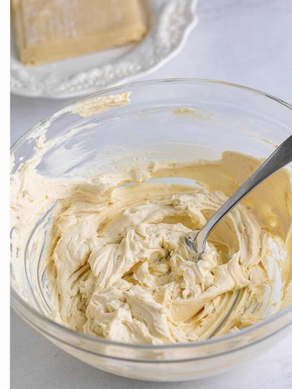 Smooth cream cheese wonton filling mixed together in a bowl.