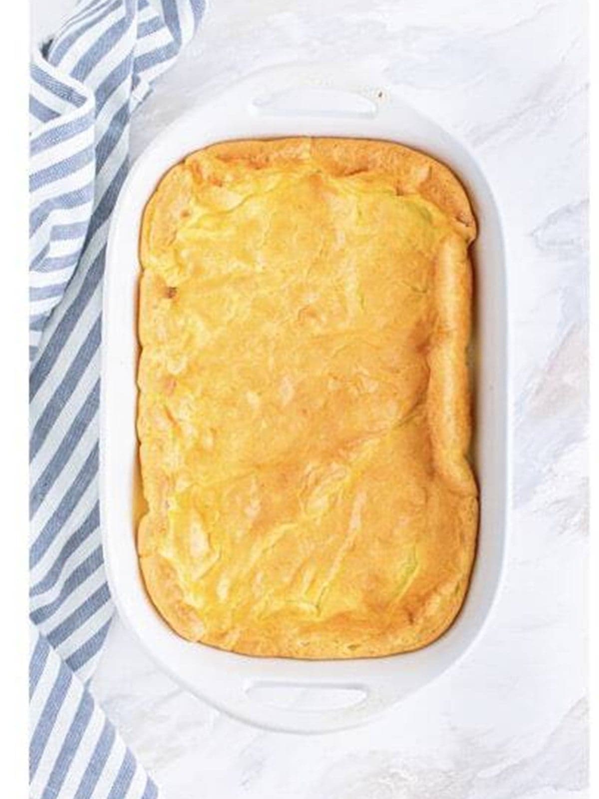 The golden baked choux pastry crust in a 9x13 baking dish.