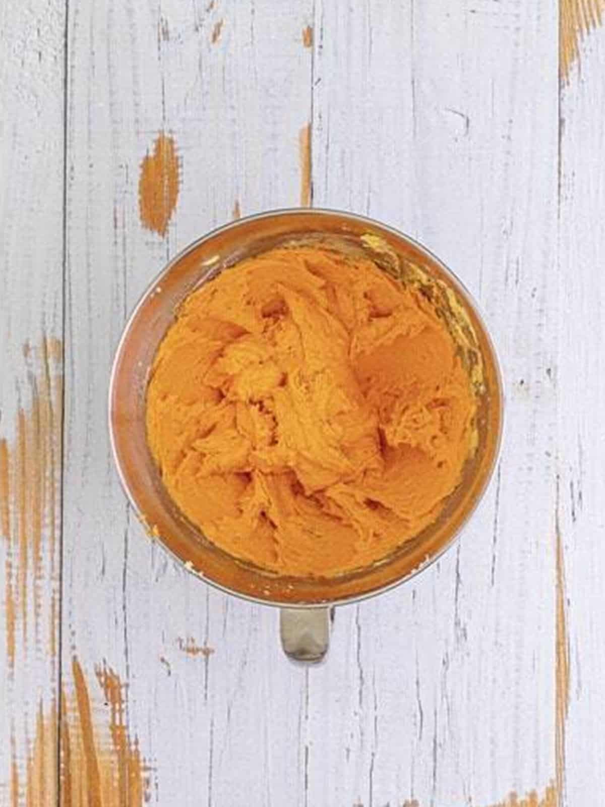 Orange creamsicle cookie dough tinted bright orange.