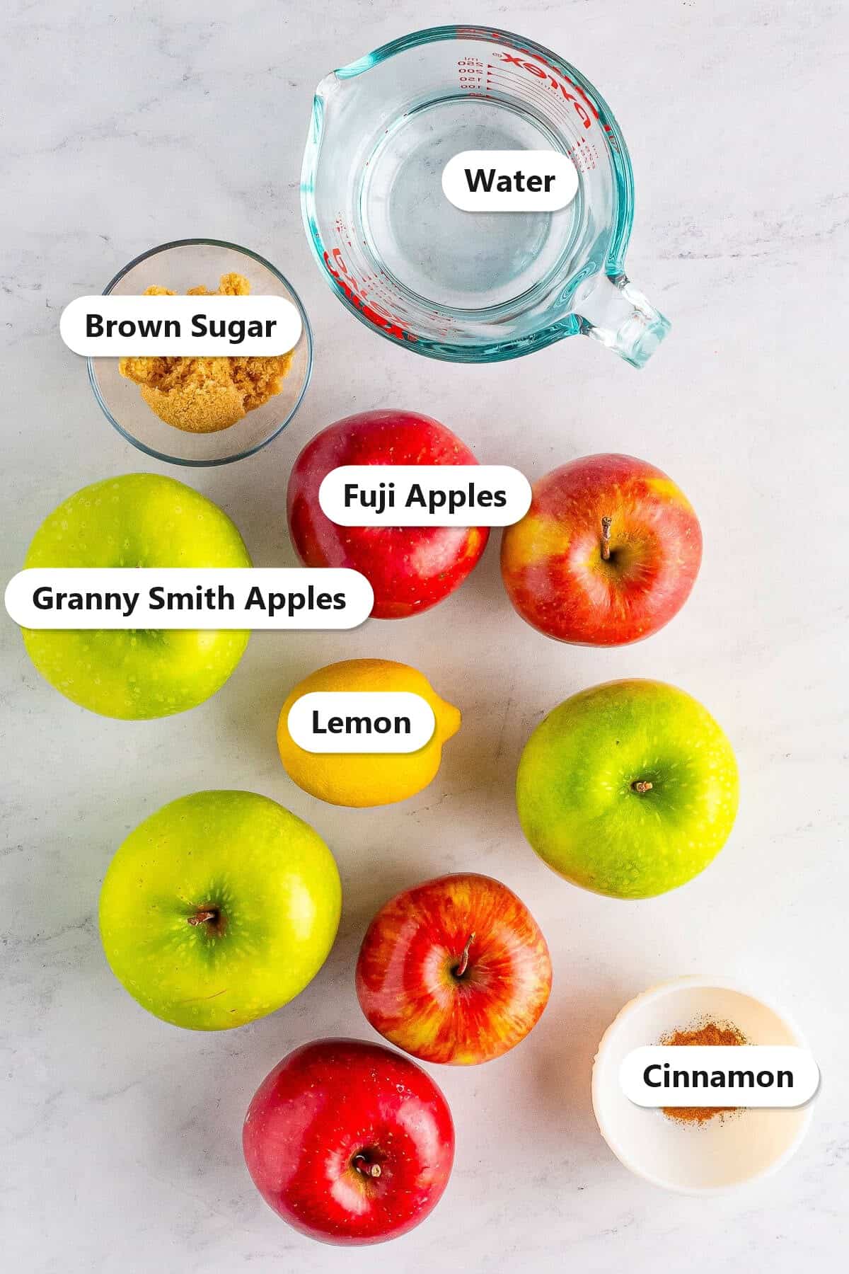 Labeled ingredients for crock pot applesauce.