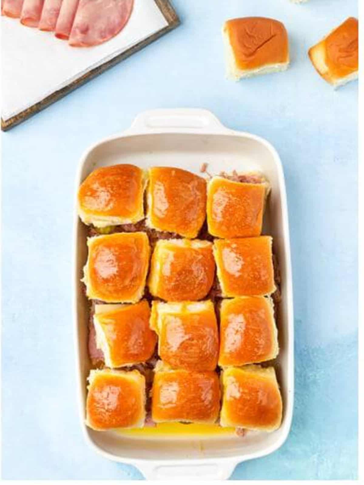 Baked Cuban sliders golden brown and ready to serve.