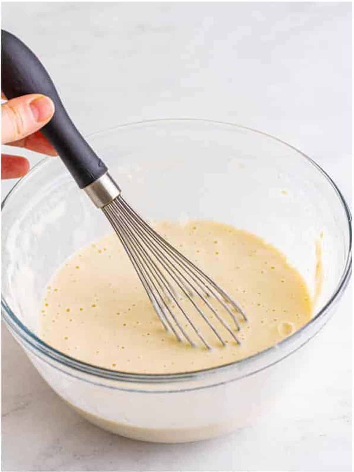 Smooth fried cheese curd batter after stirring in buttermilk and club soda.