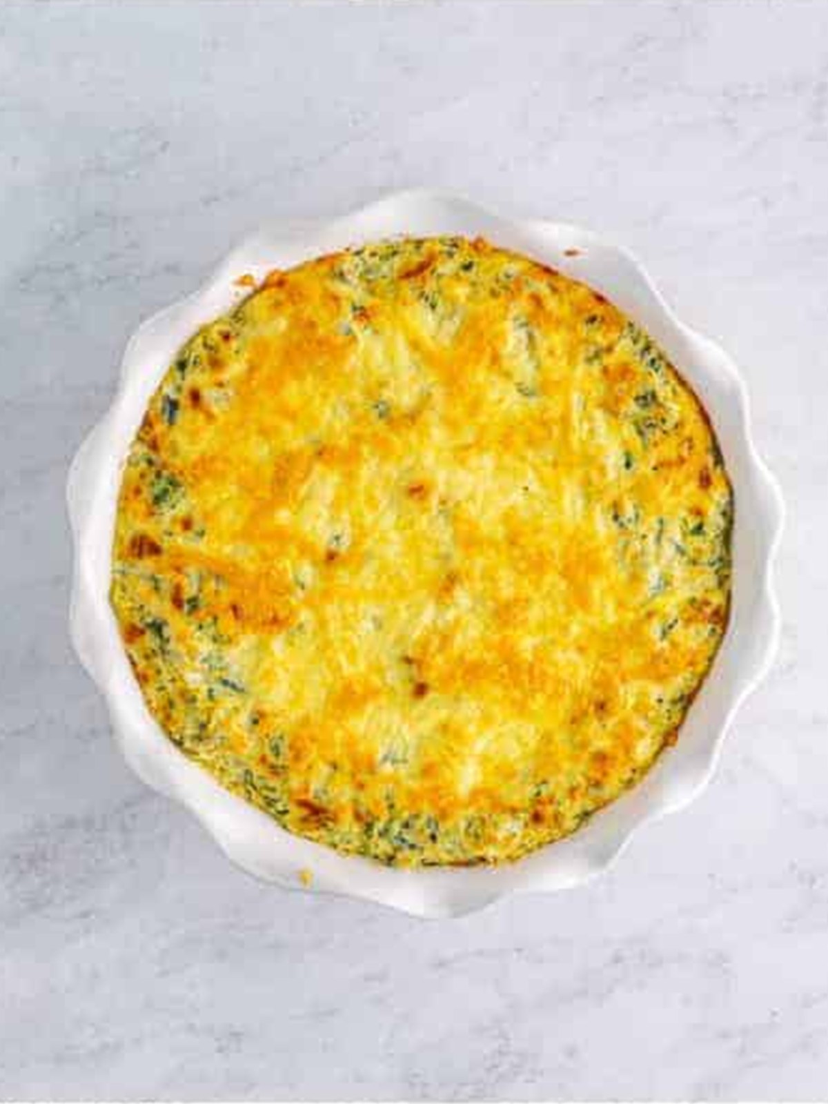 Golden, bubbly baked spinach artichoke dip fresh from the oven.