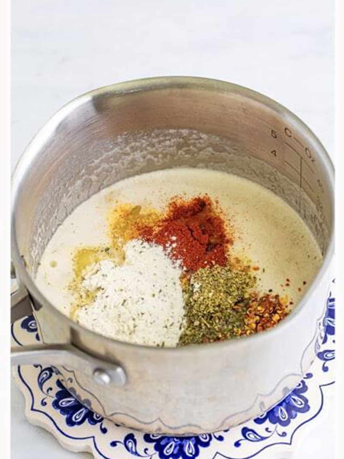 Ranch mix, brown sugar, and spices added to the melted butter.