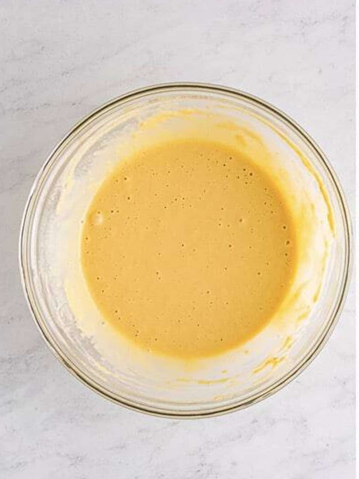 Beer and egg batter whisked smooth for fried green beans.
