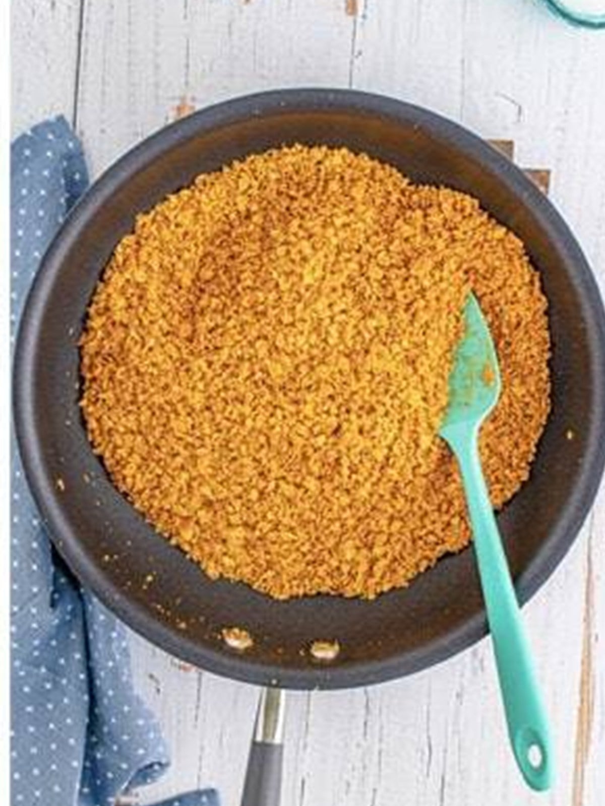 Toasting the cornflake crumbs in the skillet until golden for fried ice cream.