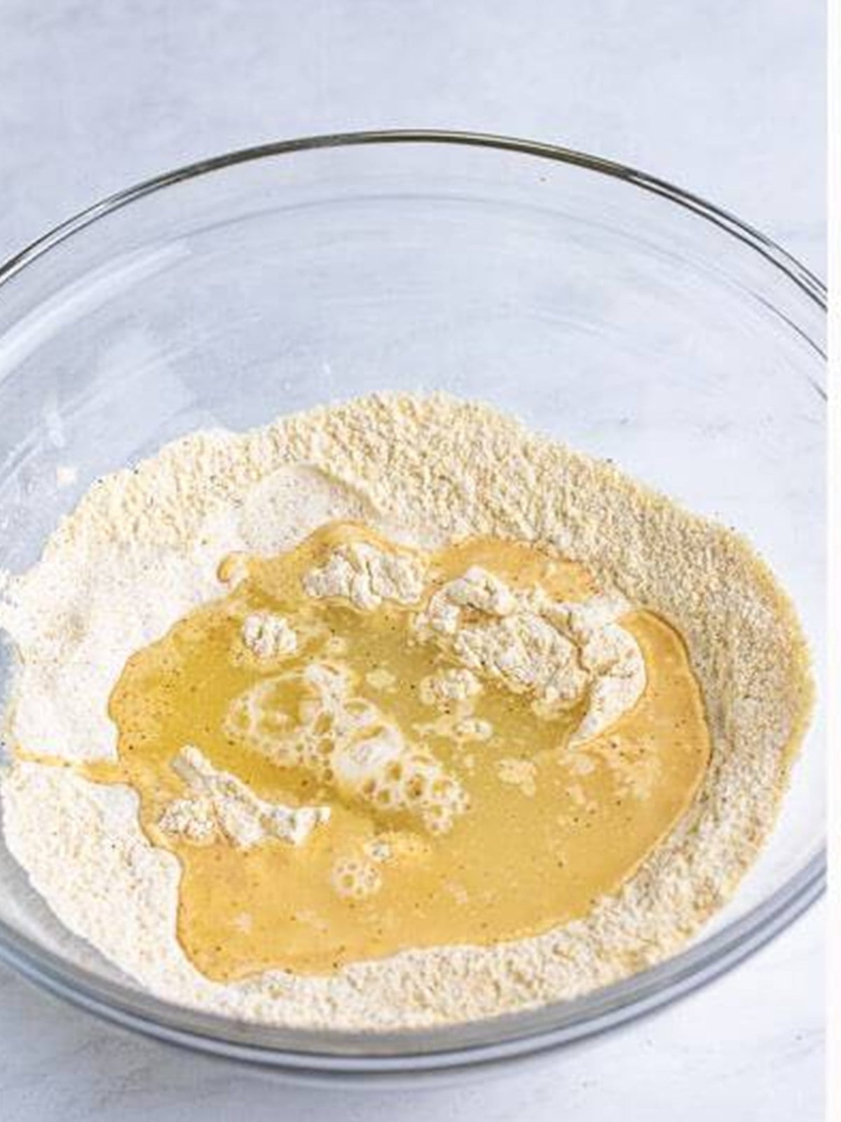 Water and pickle juice added to the dry batter ingredients.