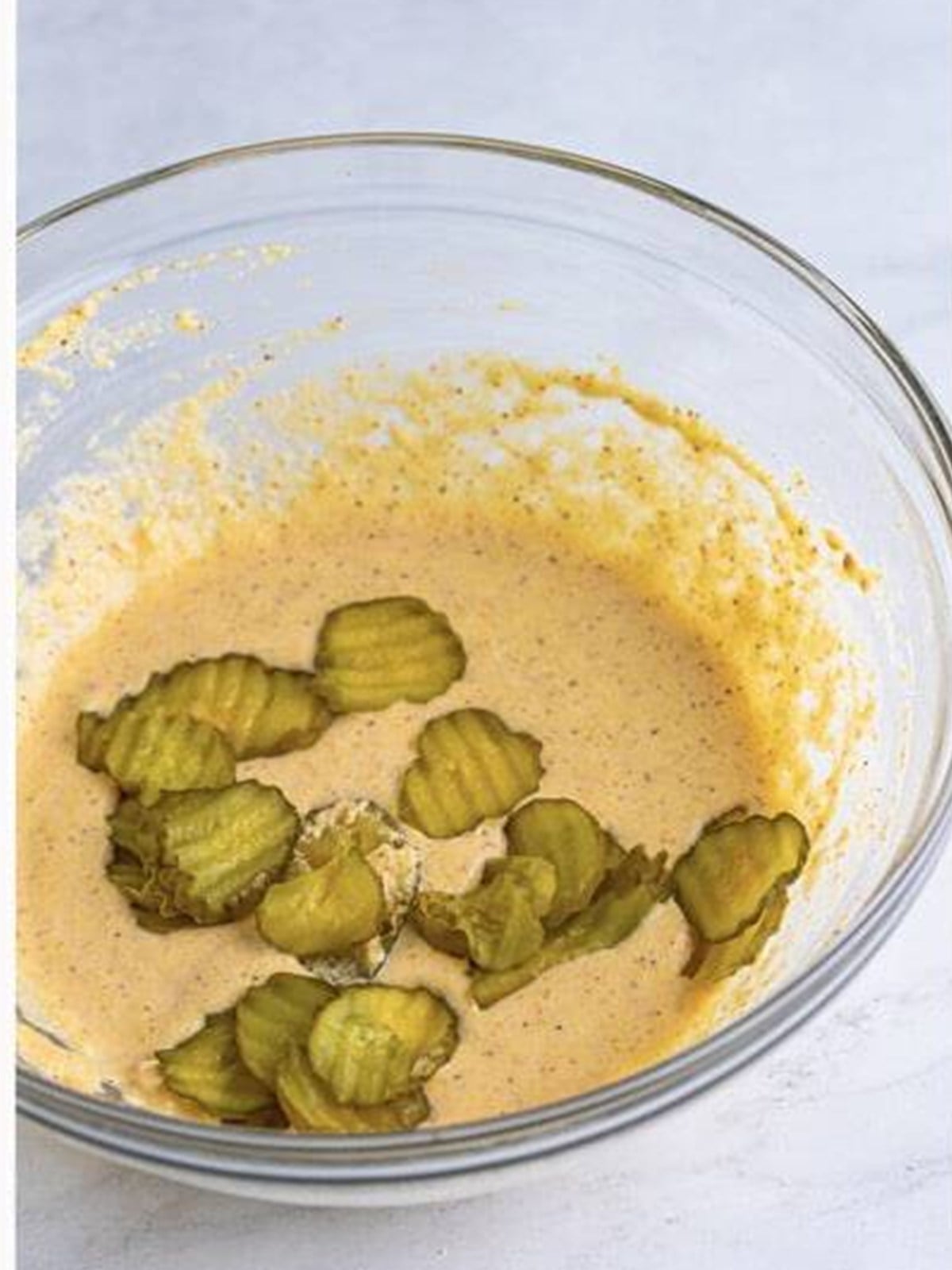 Dill pickle chips tossed in the batter to coat.
