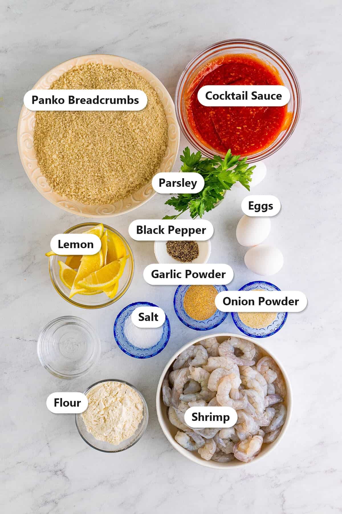 Labeled fried shrimp recipe ingredients including shrimp, panko breadcrumbs, flour, eggs, lemon, and seasonings.
