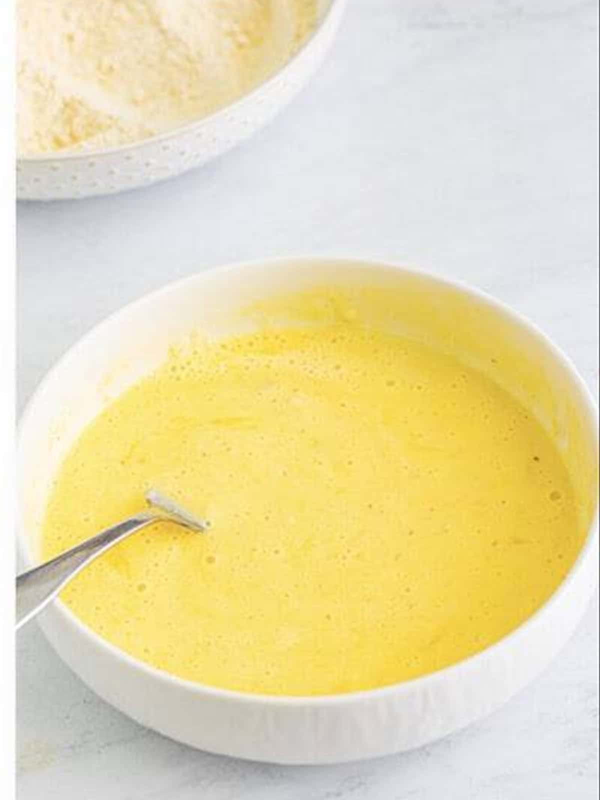 Buttermilk and egg whisked together in a shallow bowl for the wet dredge.