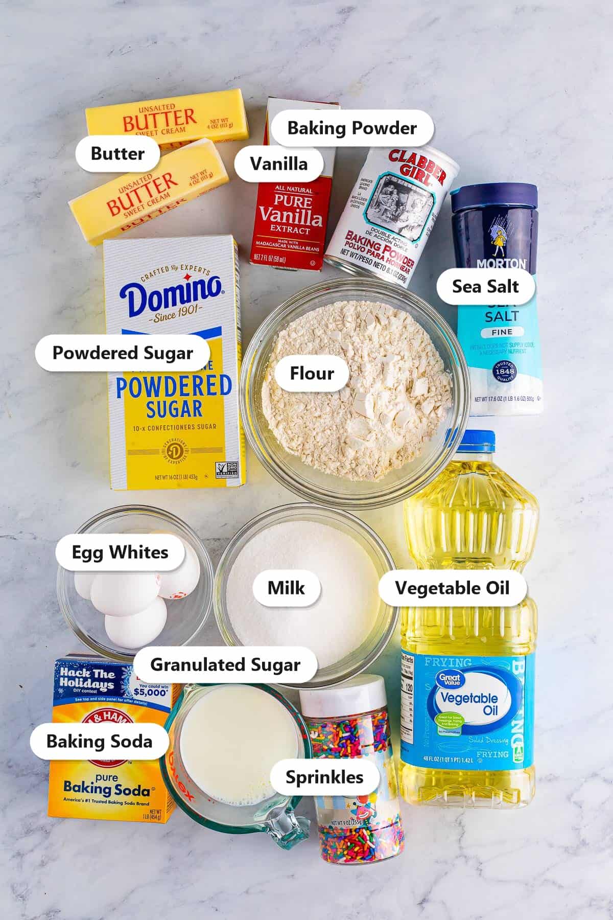 Labeled ingredients for Funfetti Cupcakes including flour, sugar, egg whites, and rainbow sprinkles.