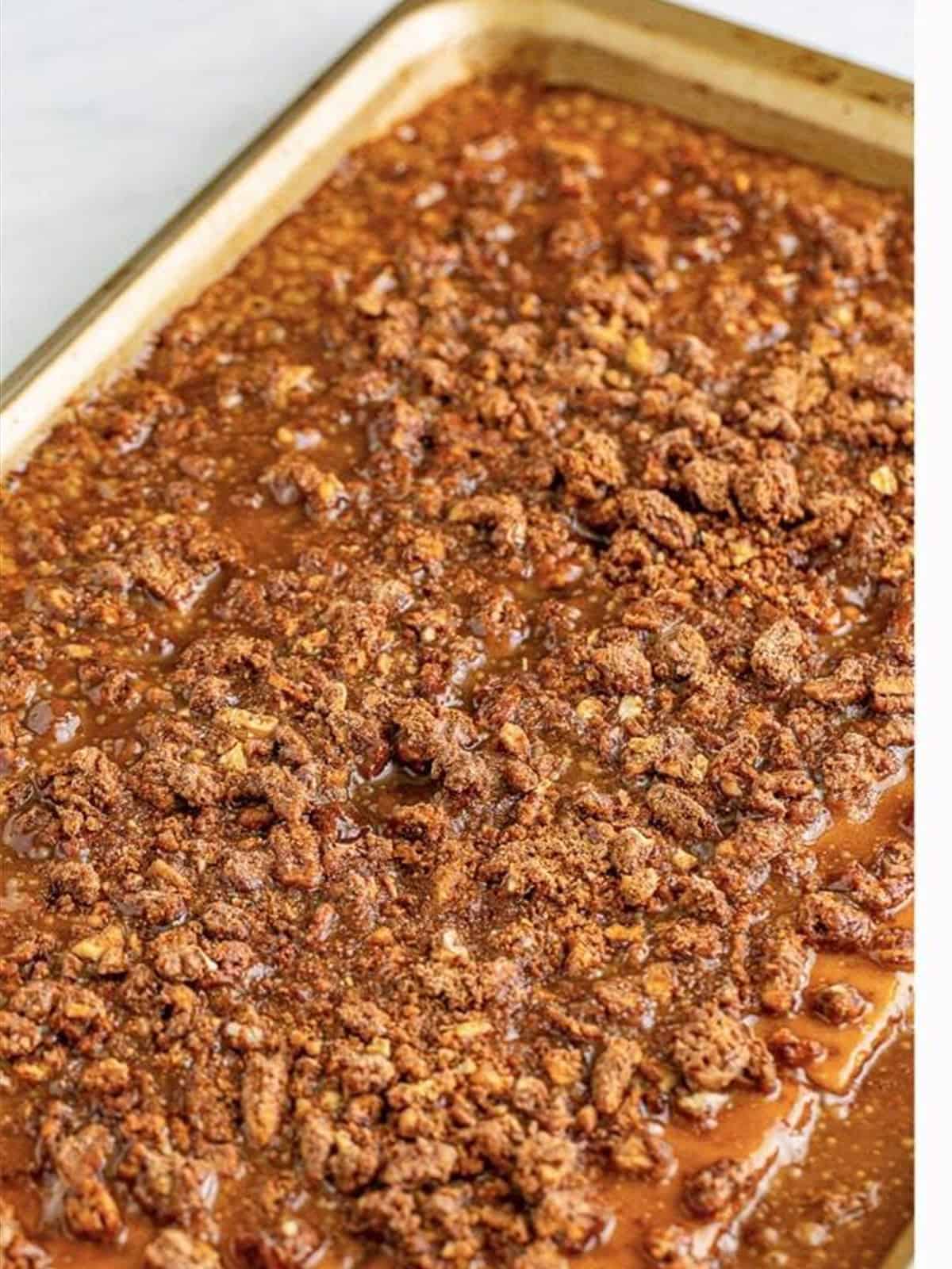Candied pecans sprinkled over the toffee-coated graham crackers.