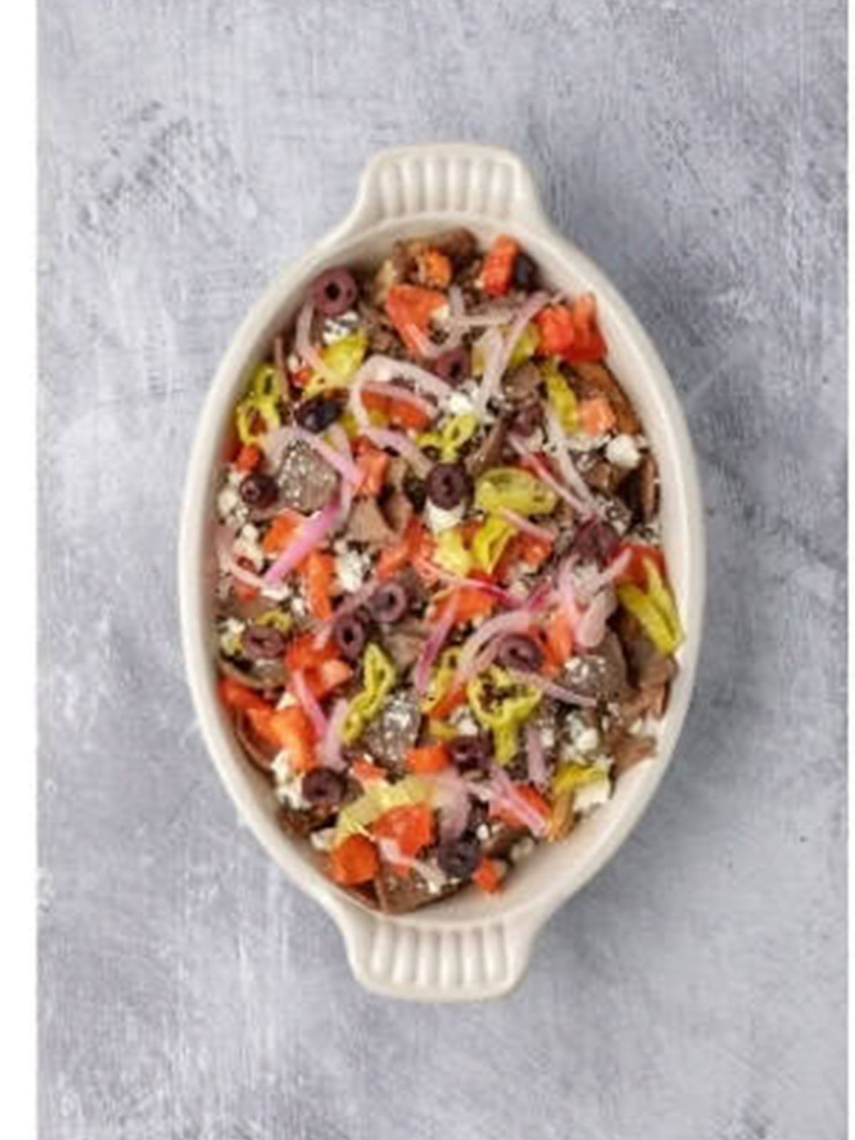 Fries topped with gyro meat, tomatoes, olives, and feta.