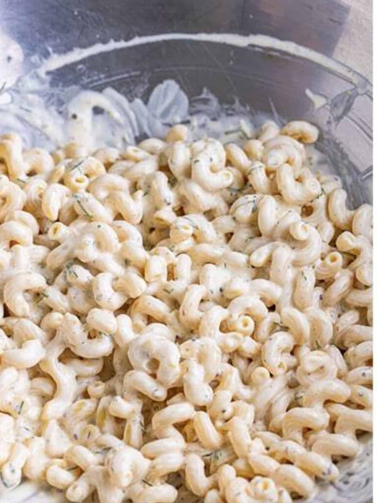 Cellentani noodles tossed in creamy dressing for Greek Pasta Salad.