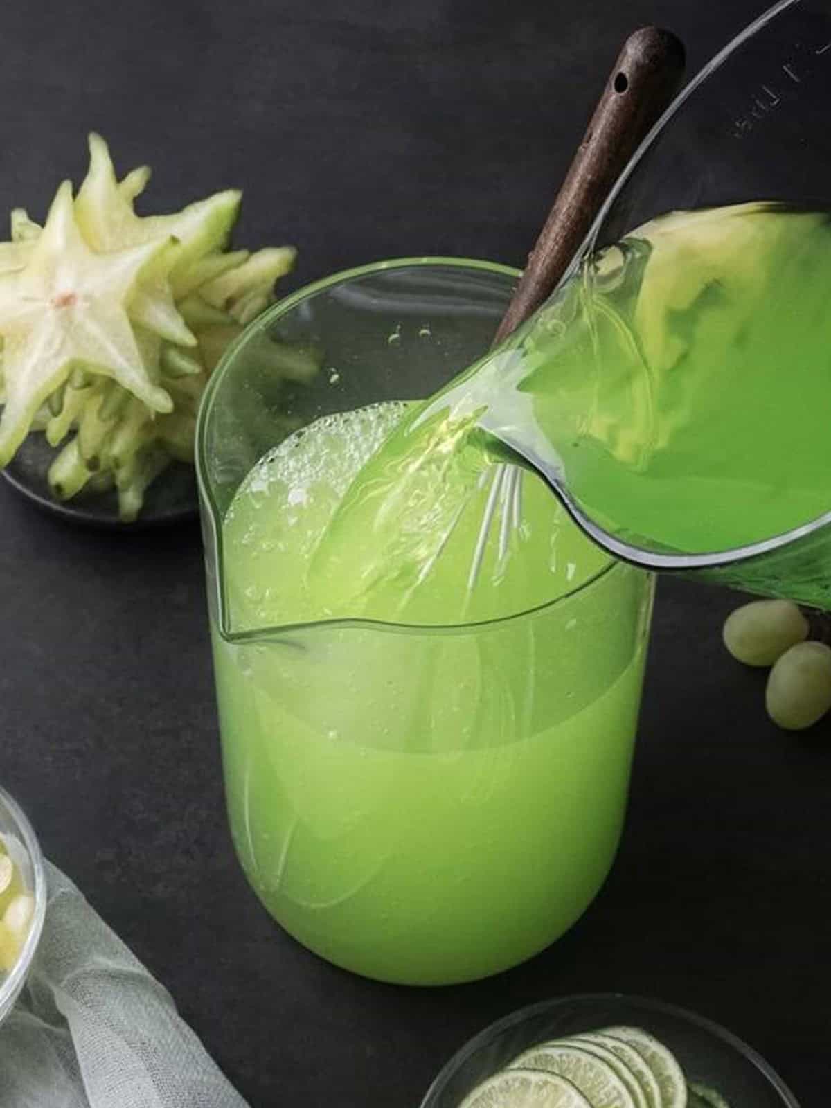 Green berry Hawaiian punch poured into the lemonade base for green punch.