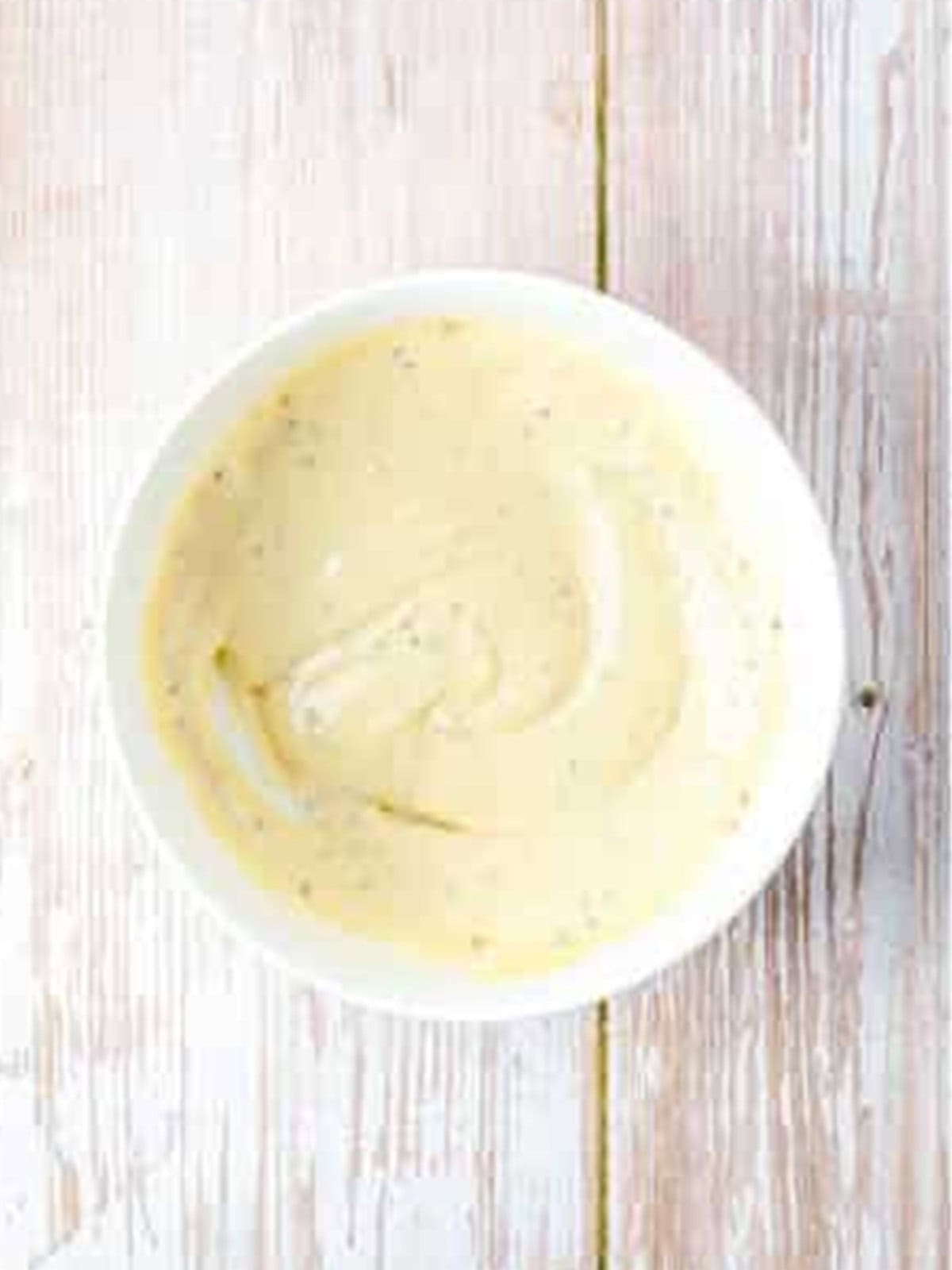 Whisking the creamy mustard sauce for the Grilled Chicken Sandwich.