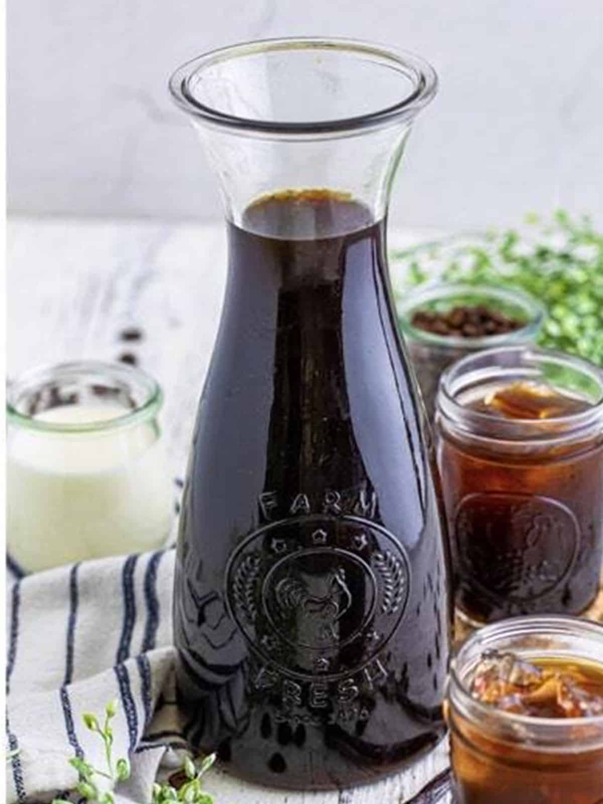 Homemade Kahlua poured into a glass bottle and ready to chill.