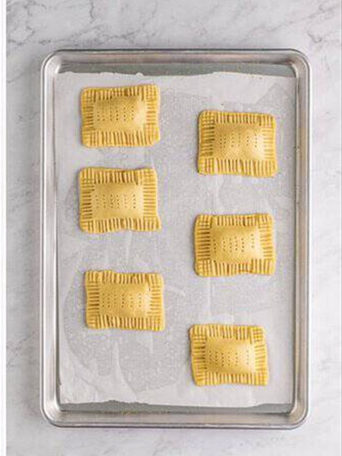 Crimping the edges of homemade pop tarts.