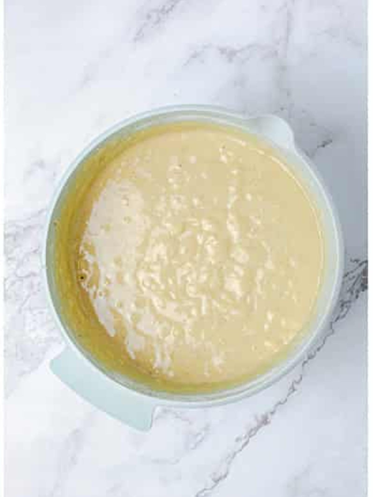 Hummingbird cake batter mixed together until just combined in a bowl.