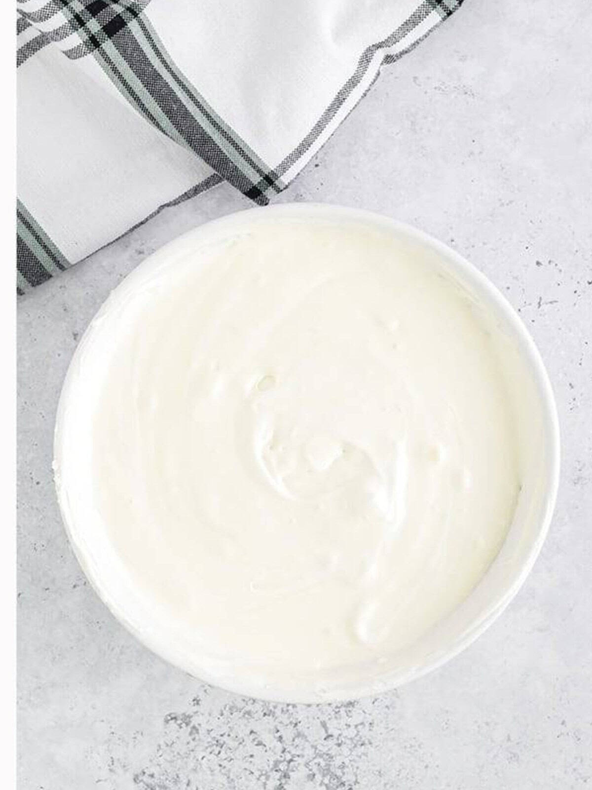 Whipped topping folded in until no streaks remain in the dirt cake filling.