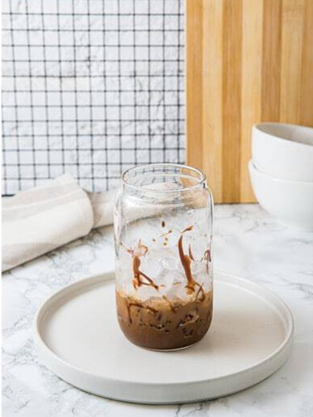 Whisking the Iced Mocha base until frothy and dissolved.