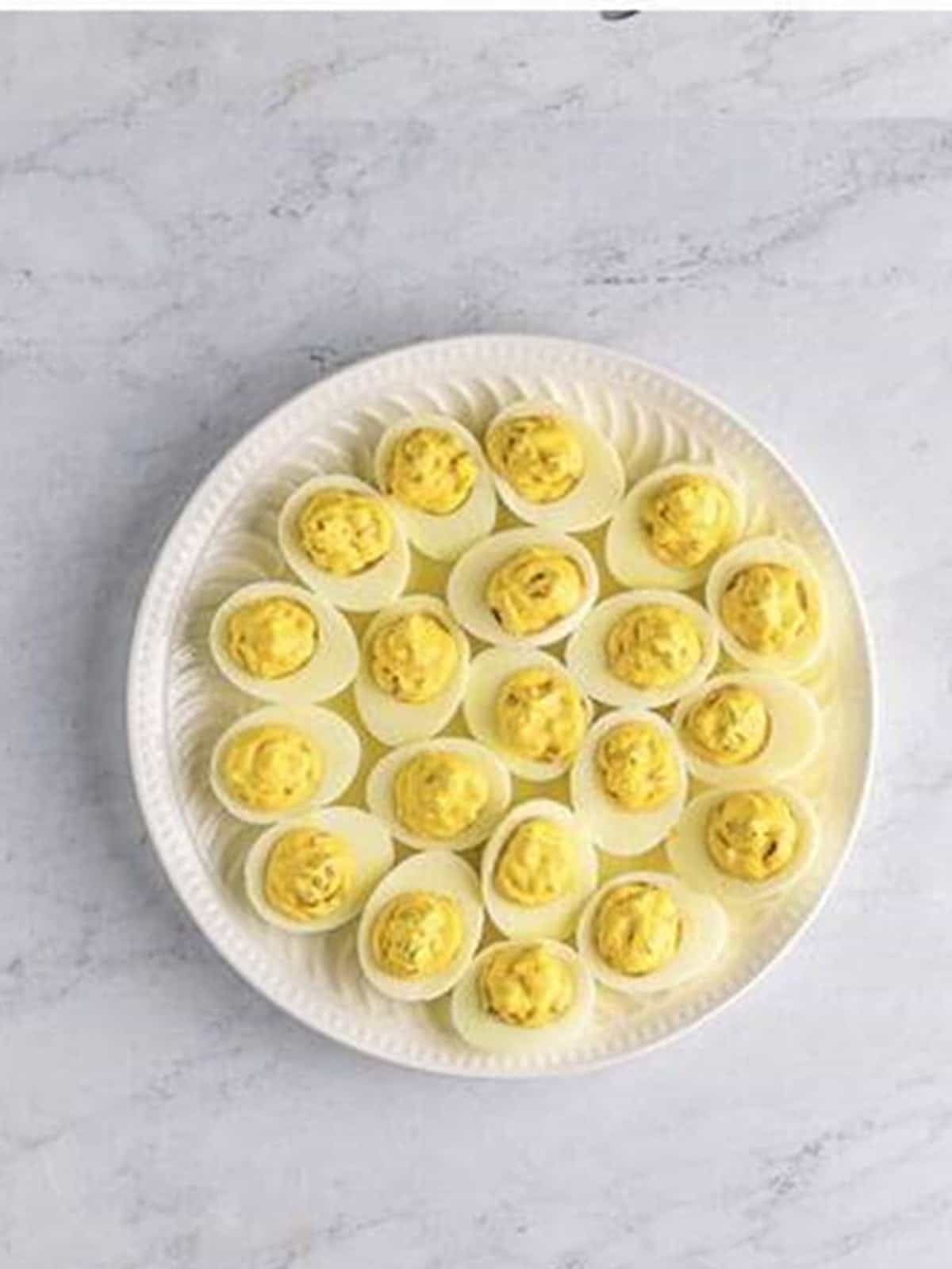 A platter of filled jalapeno deviled eggs.