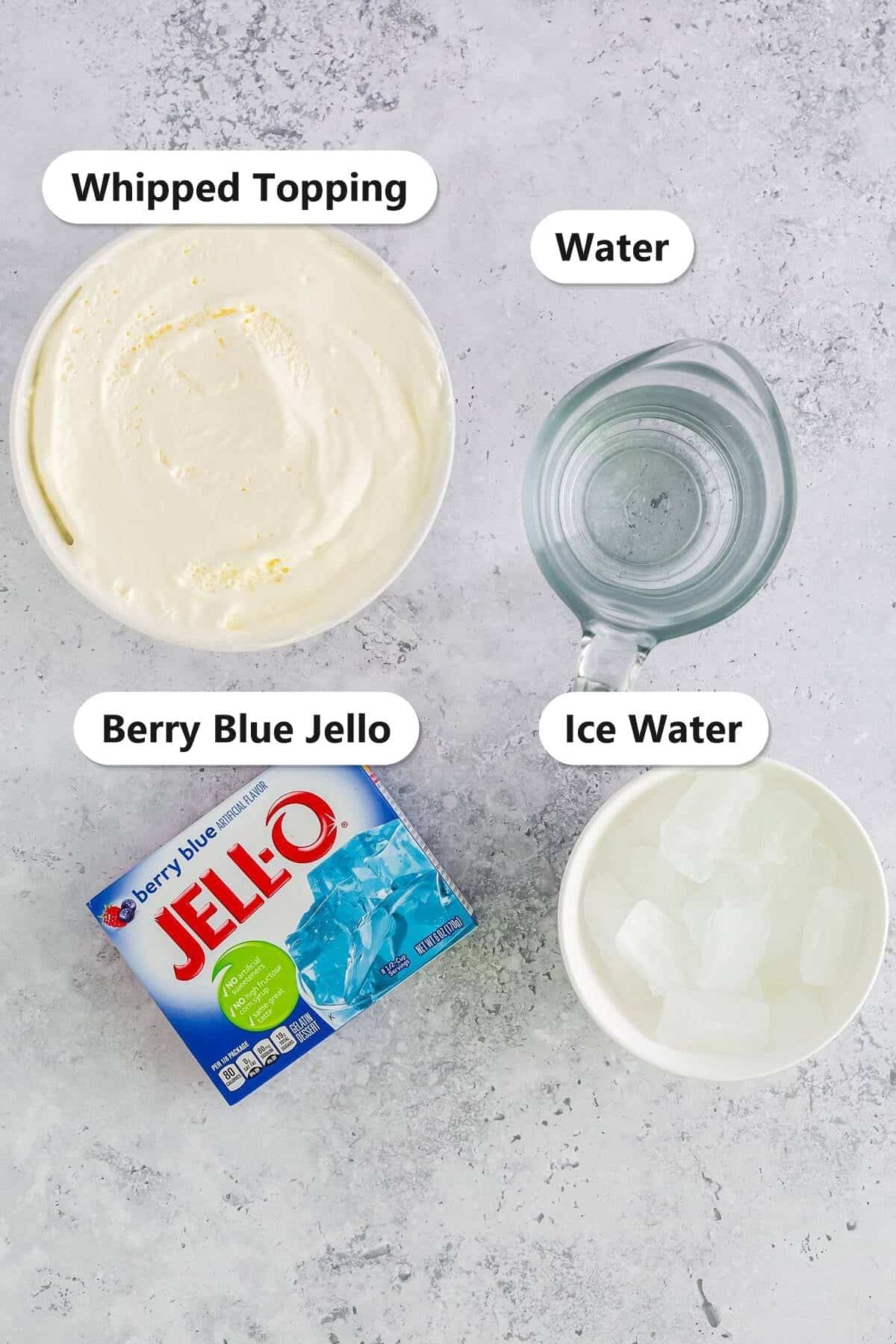 Labeled ingredients for jello mousse including berry blue jello, water, ice water, and whipped topping.